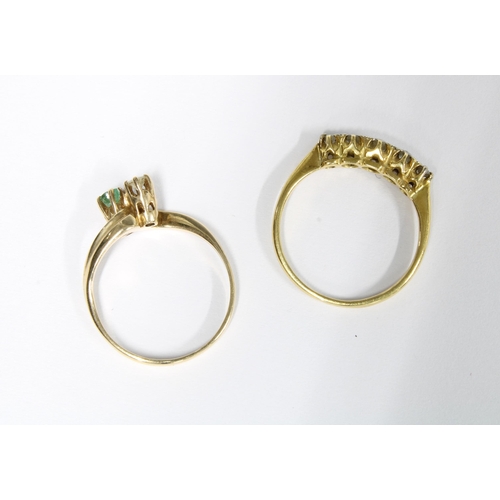 54 - 9ct gold diamond and emerald crossover ring, London 1980 and size K, and an early 20th century five ... 