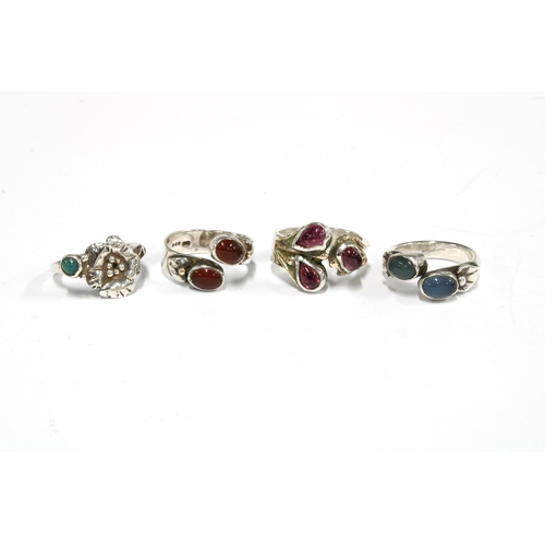 7 - SHEANA M STEPHEN (SCOTTISH) a group of four silver gemset rings, all with SMS makers mark and Edinbu... 