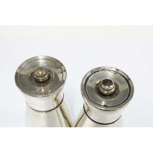 70 - Pair of Cole and Mason silver salt and pepper grinders, London 2002, 12cm (2)