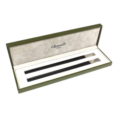 77 - Christofle ebony chopsticks with silver plated mounts, boxed