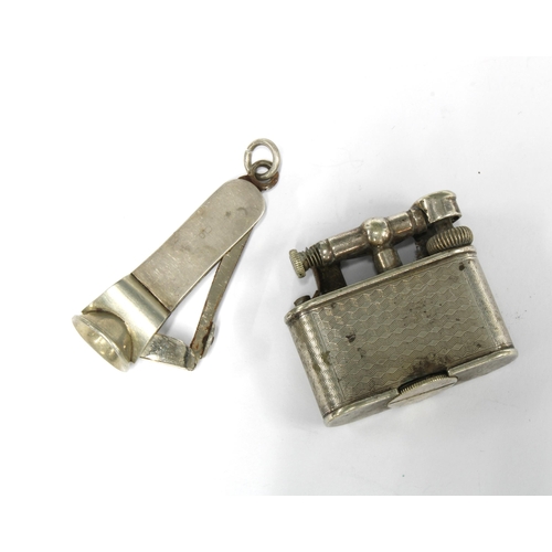 82A - Late Victorian silver and nickel cigar cutter, Birmingham 1899 and a small Dunhill lighter (2)