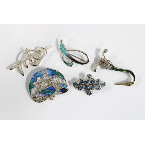 9 - OLA M.GORIE silver and enamel brooch together with three other silver and enamel brooches, two other... 