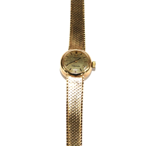 1 - OMEGA LADYMATIC, 9ct gold wristwatch, on a 9ct gold textured strap,  Birmingham 1979