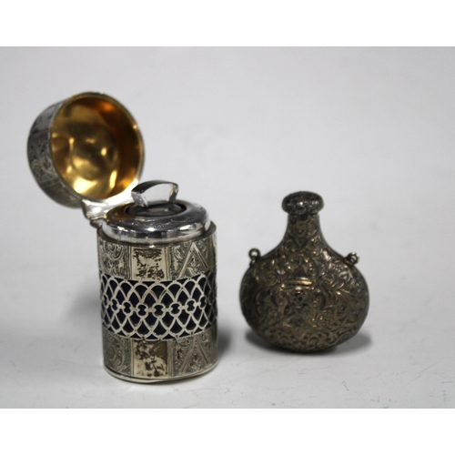 29 - Edwardian silver gilt scent bottle / smelling salts jar, with hinged cover and pierced and a blue gl... 