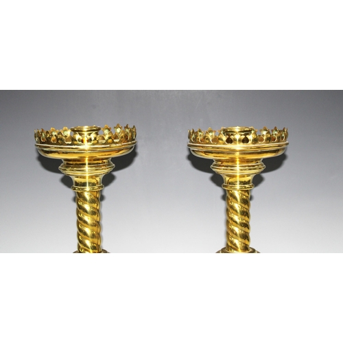 327 - A large pair of Gothic Ecclesiastical brass candlesticks for John Hardman & Co. 50cm high (2)