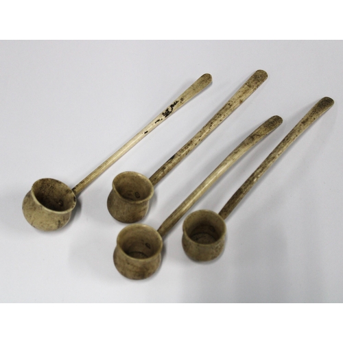 409 - Four bone spoons, 17cm long (4)