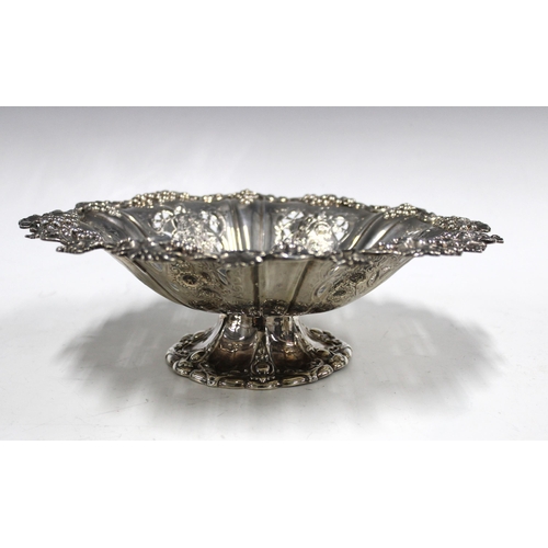 41 - Victorian silver pedestal bowl, with fruit and vine border and pierced design, Martin, Hall & Co, Sh... 
