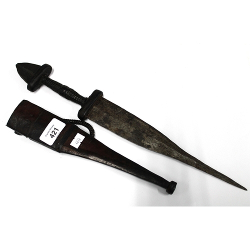 421 - Dagger with a flint to the handle, in a leather sheaf, overall length 40cm