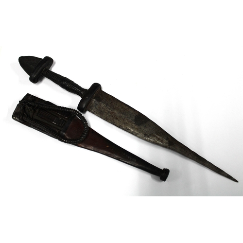 421 - Dagger with a flint to the handle, in a leather sheaf, overall length 40cm