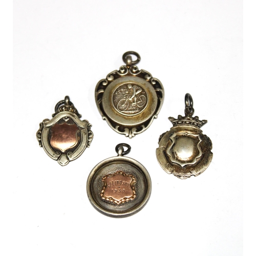 62 - Four early 20th century silver fob medals, presented to J. Lindsay, one for cycling (4)