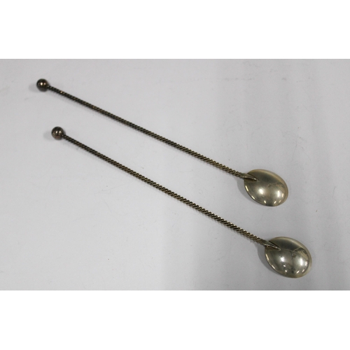 70 - A pair of Dutch silver swizzle spoons with long twisted stems (2)