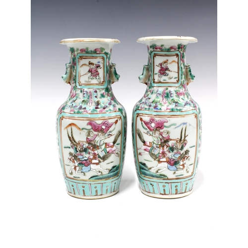 87 - A pair of Chinese famille rose baluster vases with warrior on horseback panels and  figures within a... 