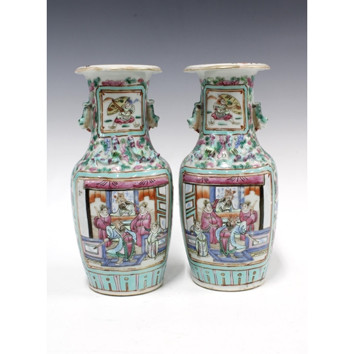 87 - A pair of Chinese famille rose baluster vases with warrior on horseback panels and  figures within a... 