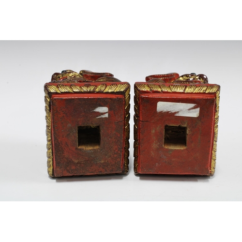 88 - A pair of Chinese painted giltwood Temple Dogs of Fo (2) 12 x 17cm.