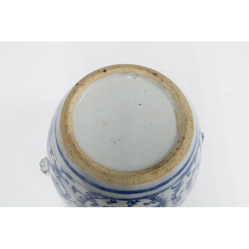 89 - Chinese provincial blue and white pottery jar, circular form with small looped handles, 14 x 11cm.