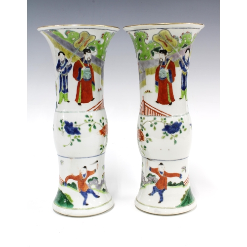 97 - A pair of Chinese Wucai Gu shape vases, each with three painted bands to include  figures on a terra... 