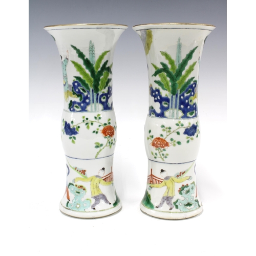 97 - A pair of Chinese Wucai Gu shape vases, each with three painted bands to include  figures on a terra... 