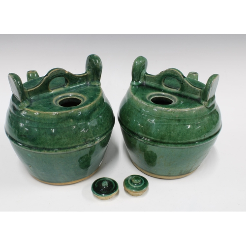 99 - Two Chinese green glazed Shiwan pottery teapots (2) 21 x 23cm