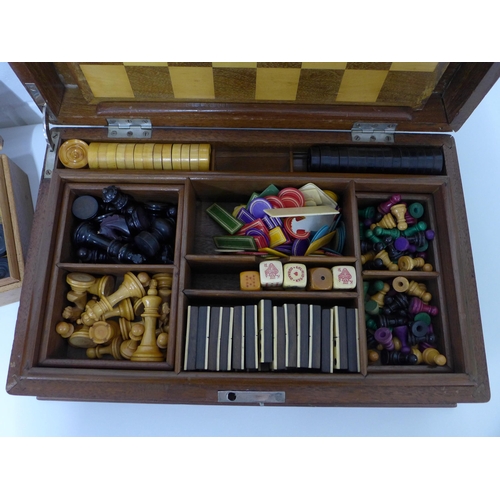 448 - Mahogany Games compendium box, including board, dominoes, chess pieces, checkers etc, 40 x 26cm, tog... 