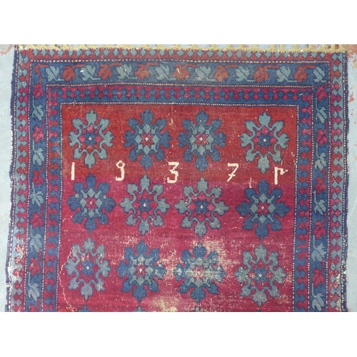 451 - Early 20th century Armenian Marriage rug, dated 1937, red field with blue flowers, likely with later... 