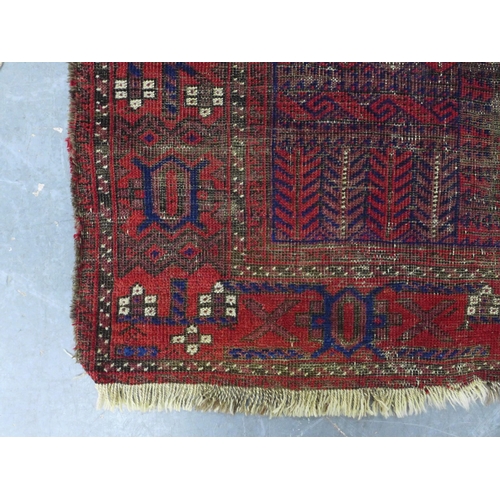 452 - Belouch rug with worn red field, 110 x 195cm.