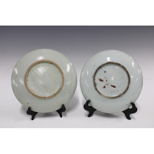 105 - Two Chinese fruit and flower pattern plates and a similarly decorated bowl,  (3) 23cm.