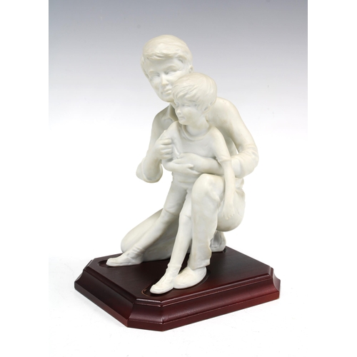 109 - Kaiser bisque pottery father and son figure group, on a wooden plinth, printed factory marks, 12 x 2... 