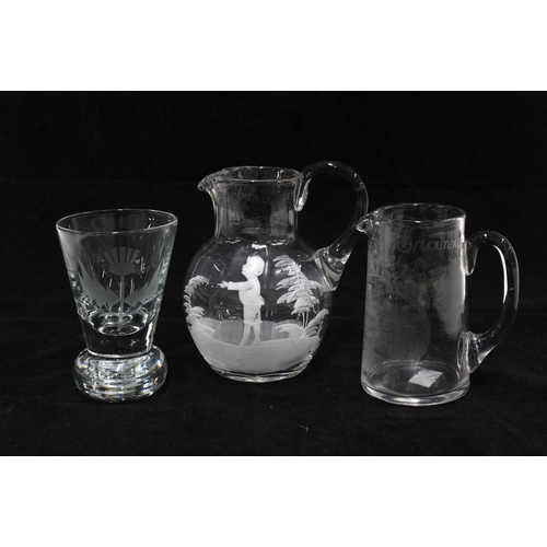 112 - Mary Gregory glass jug and a thistle firing glass and commemorative etched jug (3) 12cm.