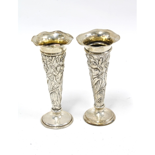 14 - A pair of Art Nouveau silver vases by William Comyns, London 1906, 13.5cm (2)