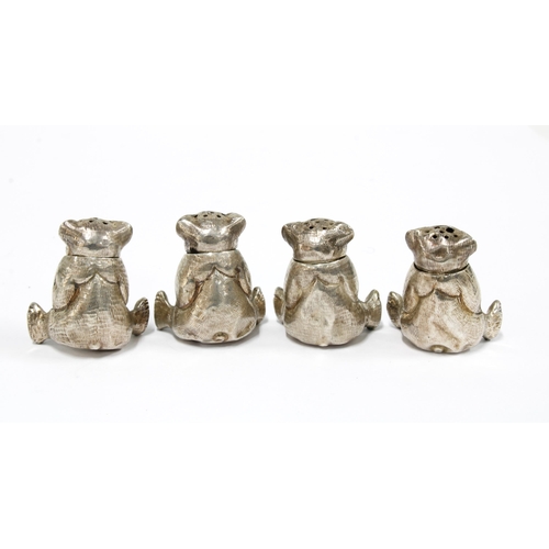 21 - Four novelty white metal pepper pots in the form of bears 3.5cm, (4)