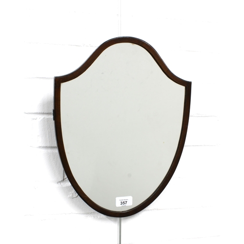 357 - An early 20th century mahogany shield shaped mirror, 31 x 40cm.