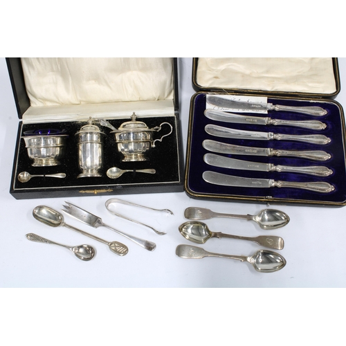 42 - George V silver cruet set, in fitted case, Birmingham 1931 together with a cases set of six silver h... 