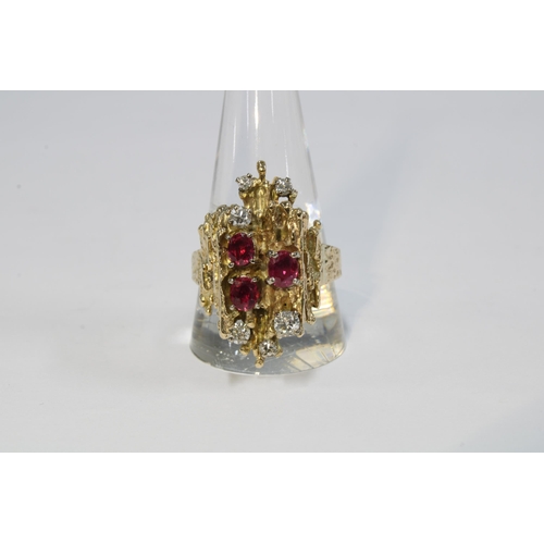 51 - Vintage 9ct gold ruby and diamond dress ring, London 1972, with three oval rubies and six diamonds, ... 