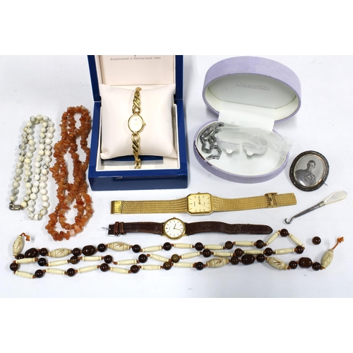 55C - ROTARY, lady's gold plated wristwatch with original box, a collection of costume jewellery beads, br... 