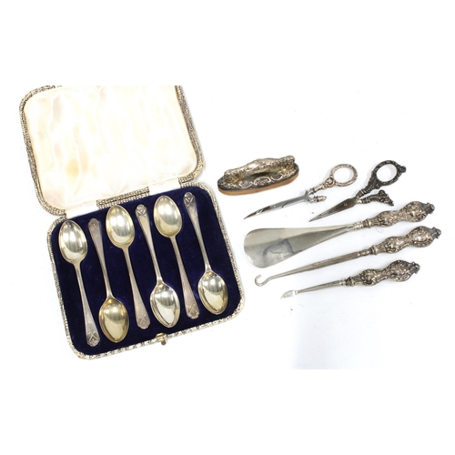 56 - Set of six Walker & Hall silver teaspoons, in fitted case together with a silver handled manicure se... 