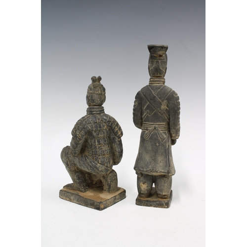 63 - Two Terracotta Army figures, one modelled standing the other kneeling, (2) 28cm high.