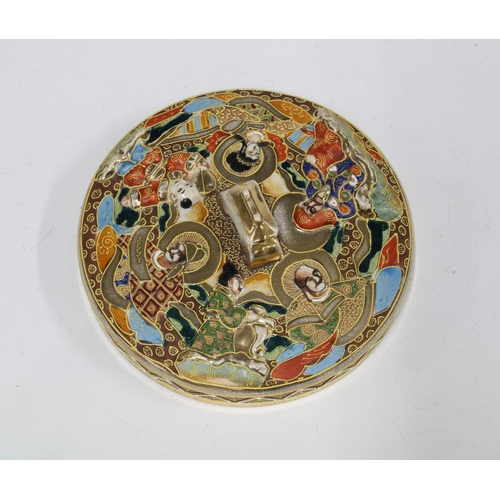 64 - Japanese Satsuma style earthenware box and cover, of circular form and decorated with figures and  c... 