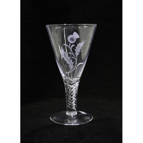 76 - A large Jacobite Revival wine glass with thistle etched pattern and spiral stem, 10 x 19cm