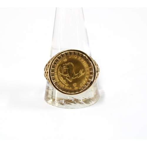 8 - A 1/10 Krugerrand 1984 coin in a 9ct gold ring setting with hallmarks for Birmingham 1985, size W (s... 