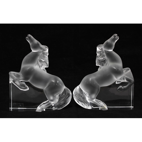 83 - Lalique, a pair of frosted glass Kazak rearing horse bookends, signed  17 x 21cm. (2)