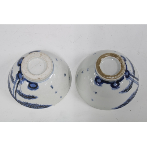 90 - Two Chinese blue and white bamboo & calligraphy pattern teabowls (2) 10 x 5cm.