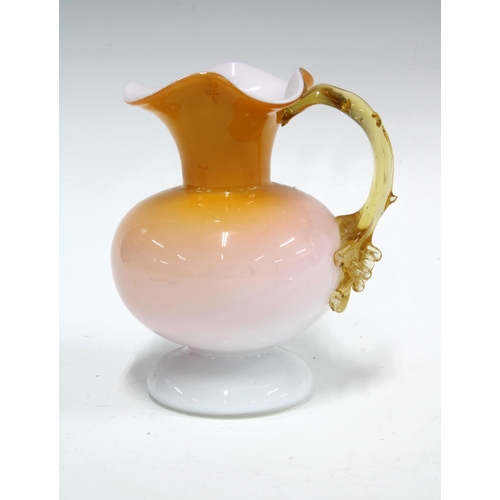 92 - Victorian cased glass jug in amber and white, 13 x 15cm.