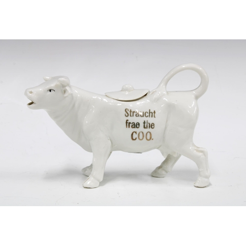 93 - 'Straucht frae the coo' cow creamer jug, 18 x 11cm.