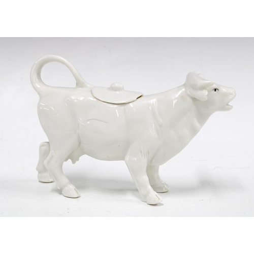 93 - 'Straucht frae the coo' cow creamer jug, 18 x 11cm.