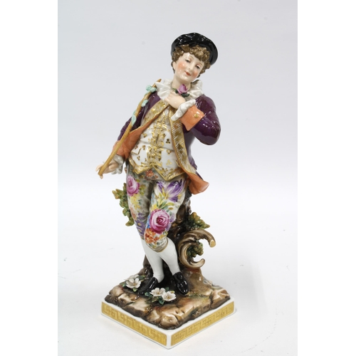 379 - 19th century Volkstedt porcelain figure of a Gallant Gent, wearing a puce jacket and floral breeches... 