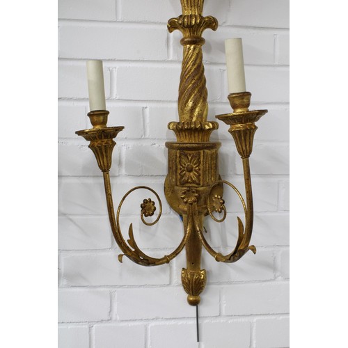 359 - A pair of giltwood wall lights with eagle surmounts and twin branches (2) 33 x 85cm.