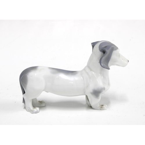 102 - Royal Copenhagen style porcelain figure of a Dachshund, 8cm high