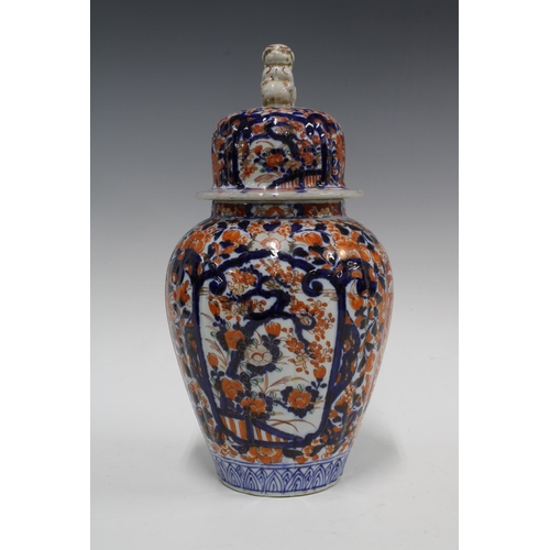 109 - A large Imari vase and cover of lobed form, the cover with a shishi finial, 34cm