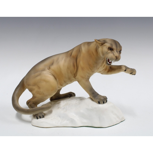 114 - Beswick puma, in a matt glaze, model No. 1702, 21 x 32cm