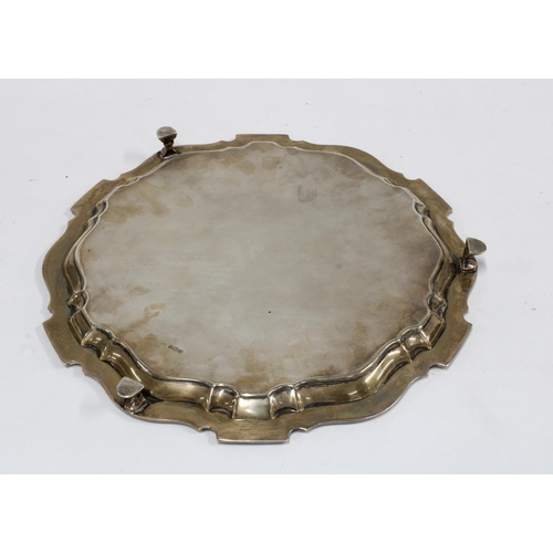 28 - George V silver salver, circular with pie crust border and three hoof feet, Mappin & Webb, Sheffield... 